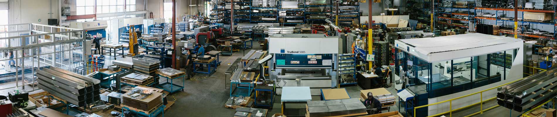Wesgar's Certifications banner image: bird's eye view of a sheet metal manufacturing warehouse with various machines and people shown