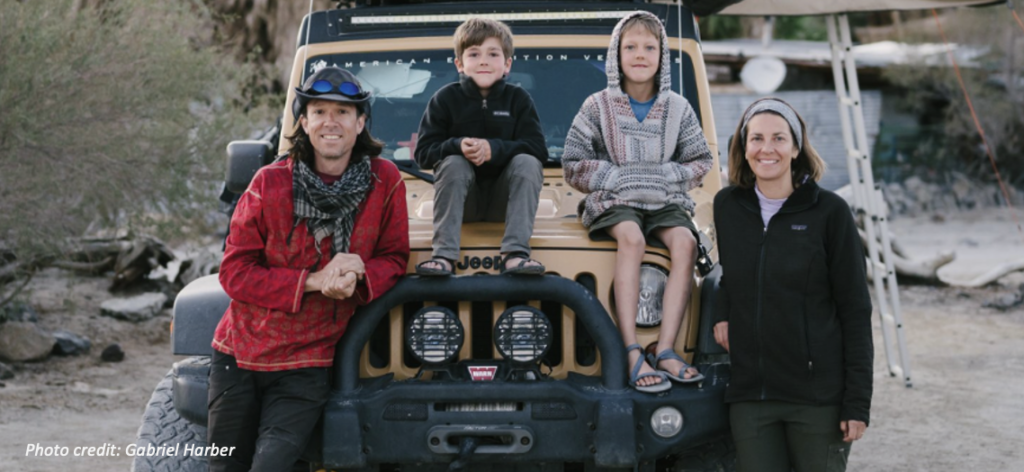 Wesgar blog cover image: smiling family of four surrounding a Jeep in the wilderness