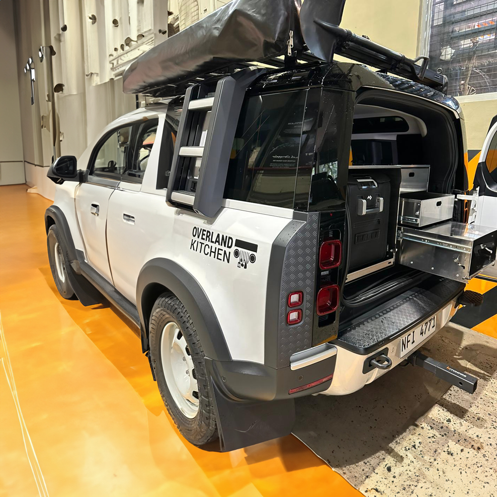 Wesgar blog image: an open SUV showing the modular sheet metal parts of an Overland Kitchen